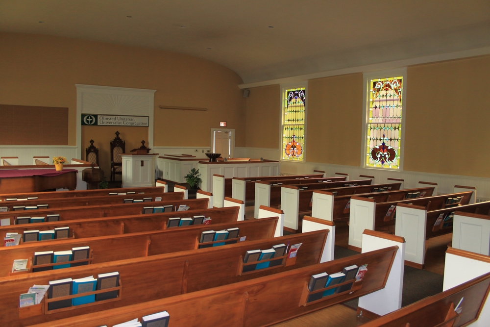 sanctuary with original stained glass windows